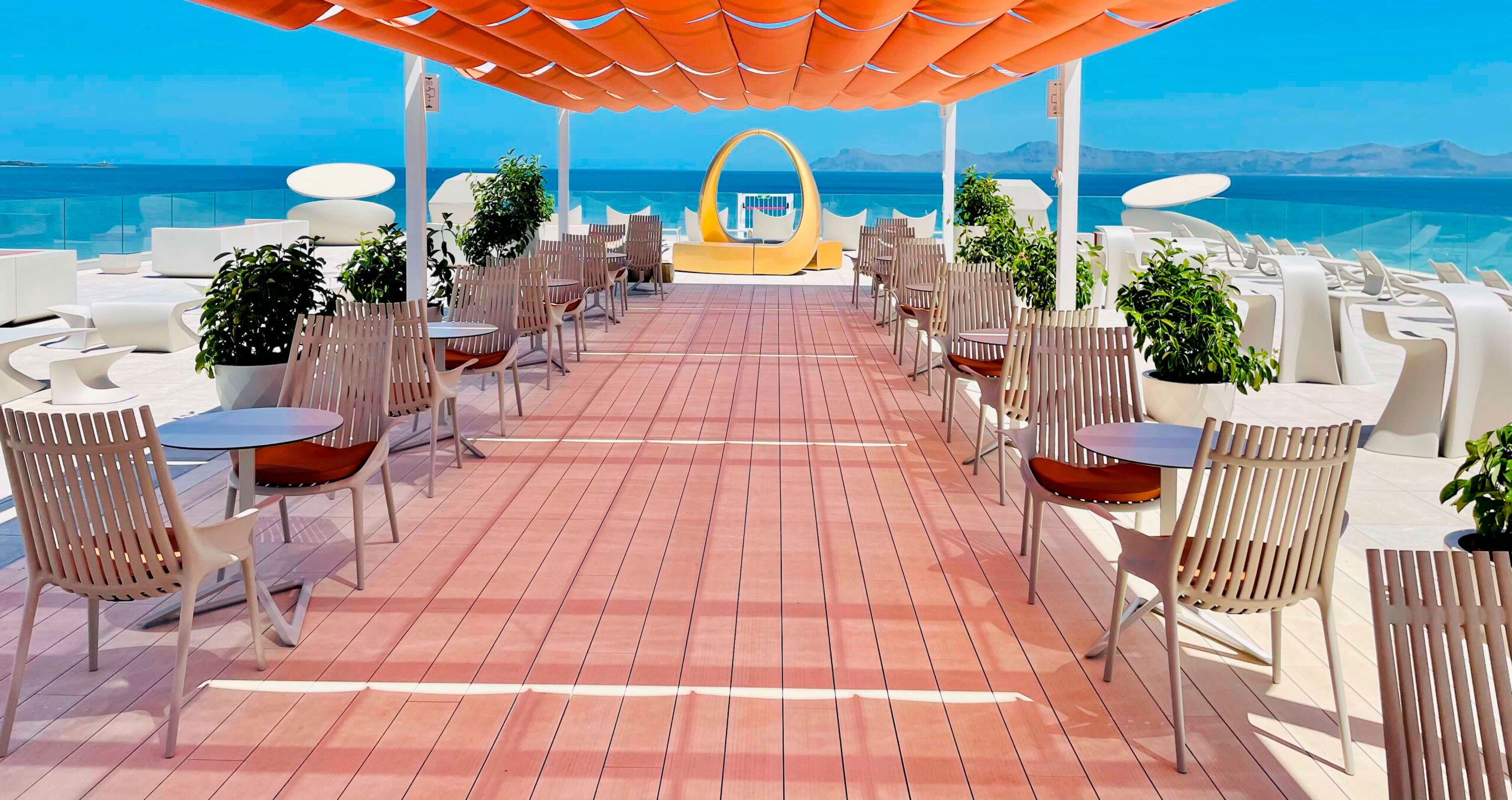 Outdoor contract furniture Ibiza armchairs and Delta tables, hospitality furniture by Vondom